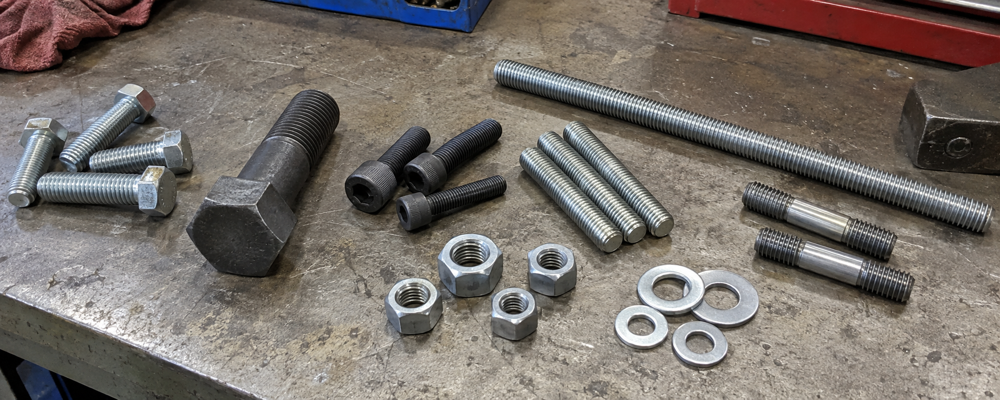 Types of industrial fasteners including bolts stud bolts nuts and washers